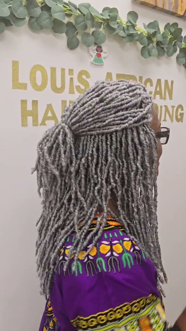 Crochet Faux Locs styled at Louis African Hair Braiding